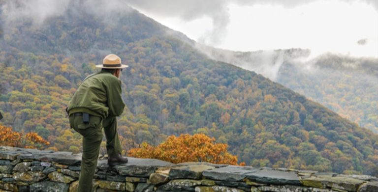 Park ranger overlooking a vista at a national park