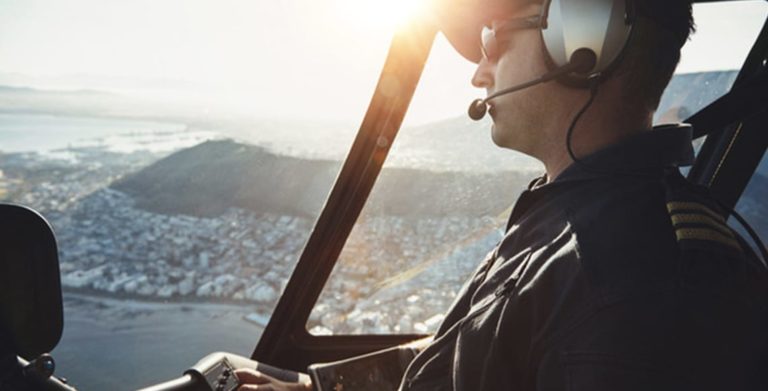 Close up of helicopter pilot flying